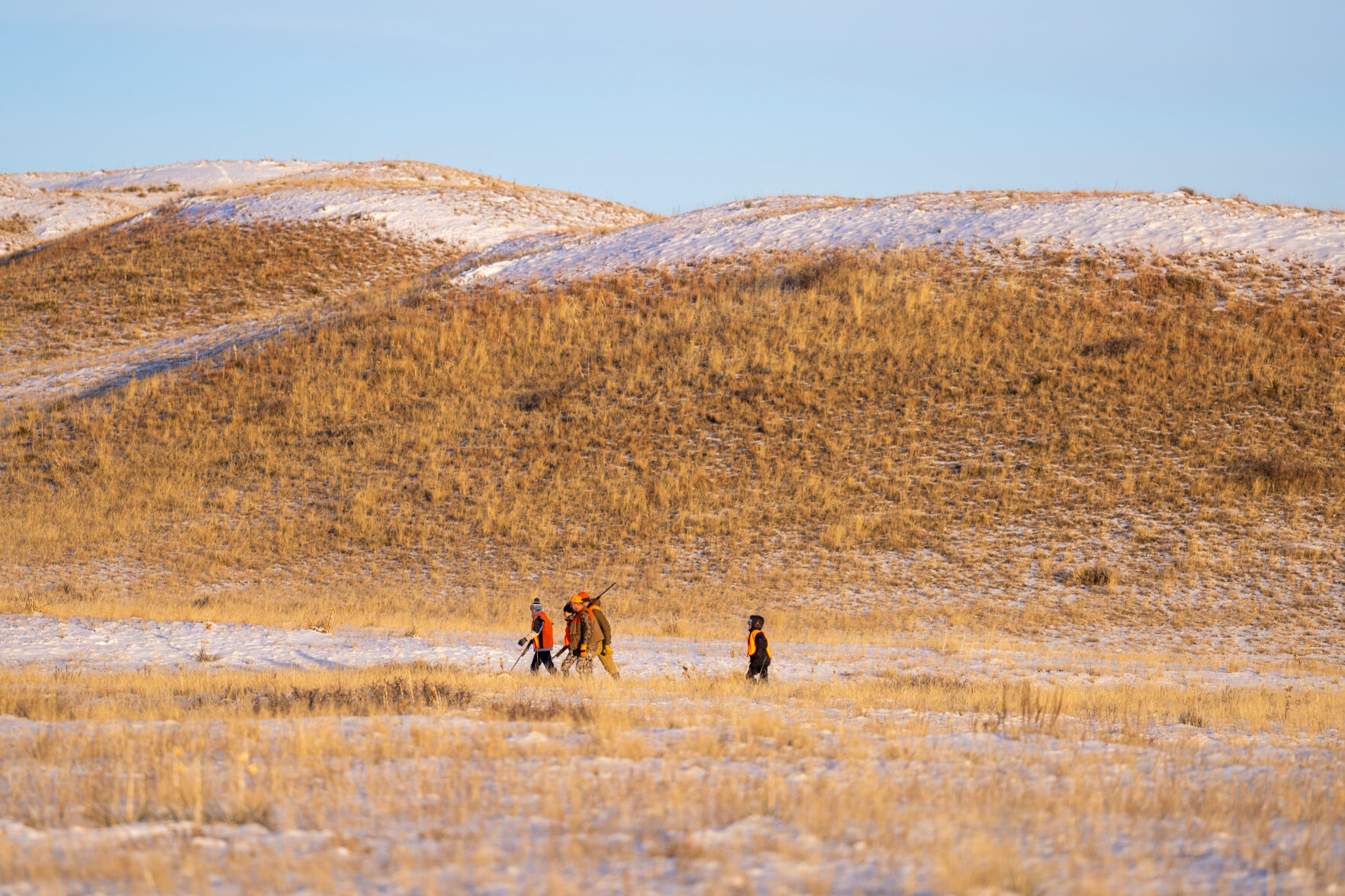 A group of young hunters and their parents
